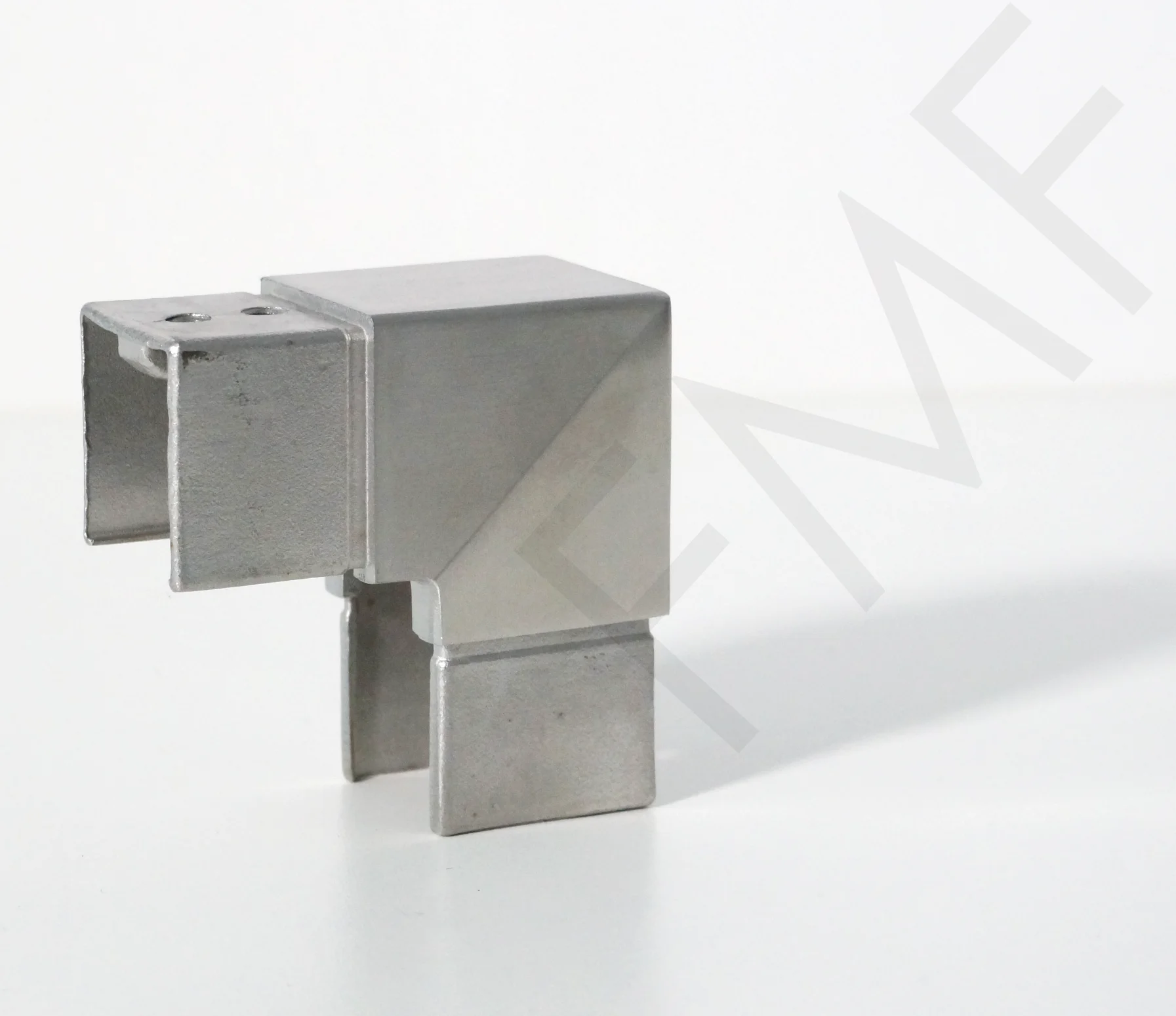 90° Vertical Elbow for 40x40mm Square Cap Handrail is used for connecting square cap handrails at a vertical angle of 90°. It is one of the most popular fitting items used for handrail installations in interior and exterior spaces. Manufactured for 316 Grade Stainless Steel, it comes with strength and durability to secure the vertical connection of square cap handrails. Its sleek design and Stainless Steel finish give a sophisticated look to your handrails. It is ideal to use at residential and commercial properties for staircases, porches, balconies, etc. They are easy to install and use. It creates a 90° vertical fit on the square handrail. Choose from a wide range of railing hardware products available at FMF Glass Hardware to accomplish your architectural projects.