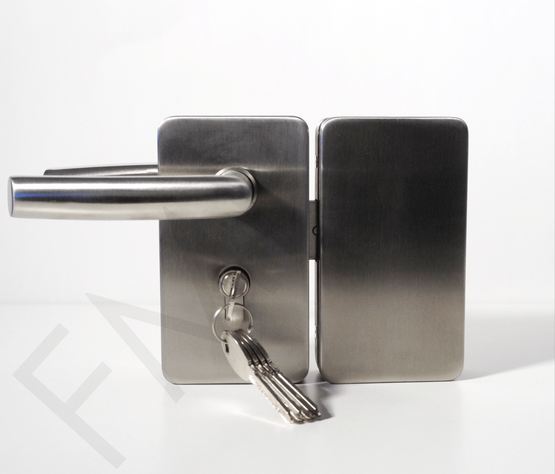 FMF 300 Series Glass-Glass Door Locks secure the glass doors with a solid handle. The rectangular-shaped commercial glass door locks are made of Aluminum with a coating of Stainless Steel. The neat rectangular shape with curved edges provides a sophisticated appearance to the overall theme around the glass doors. The 300 series is a great architectural feature for your main entry glass door, glass panel doors and modern glass doors around the commercial properties. The minimalistic design and unique finish complement any modern decoration. The fixed and solid handles are strong enough to pull and push them multiple times for several years.