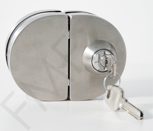 Check out FMF 400 Series Glass Door Locks with a circle shape to feature a sleek and modern design. These locks are the best choice for anyone looking for a combination of maximum security, design, and quality. They do not require any cut-outs on the glass, offering a seamless appearance of the glass door. Get the best value of our glass door locks by installing them on your glass doors at the front gate, patio, etc. They are available in several styles, such as glass-to-glass locks and glass-to-wall locks, along with a Brushed Stainless finish to match every design requirement of architects. With our glass door locks, your security is improved.